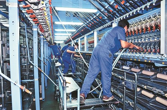 泉州服裝加快“機器換人”步伐-中國僑網